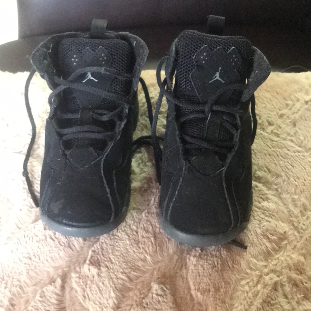 Black air Jordan’s size 9c. Suede like material.